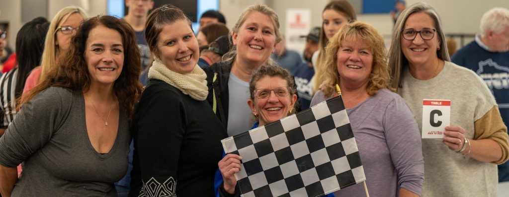 Race to Feed participants smiling at camera